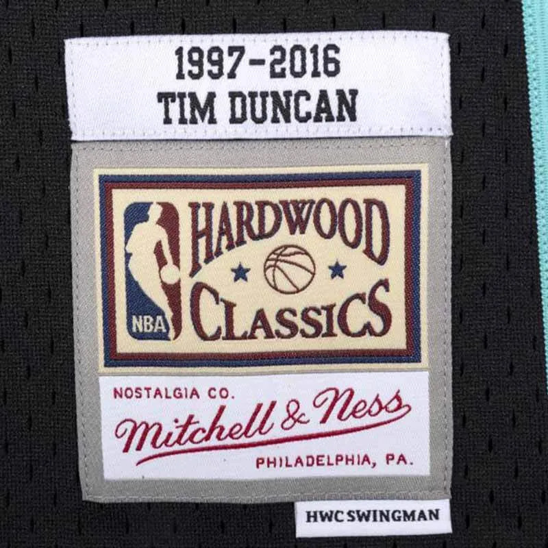 BAJU BASKET MITCHELL N NESS San Antonio Spurs Tim Duncan Hall Of Fame Swingman Jersey