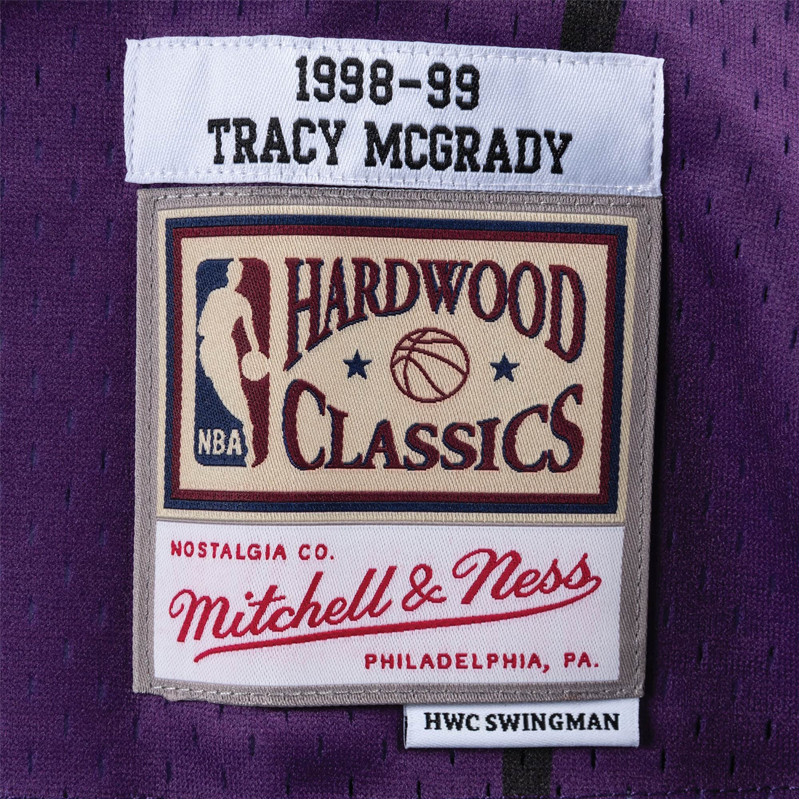 BAJU BASKET MITCHELL N NESS Tracy McGrady Toronto Raptors 1998-99 Swingman Jersey 